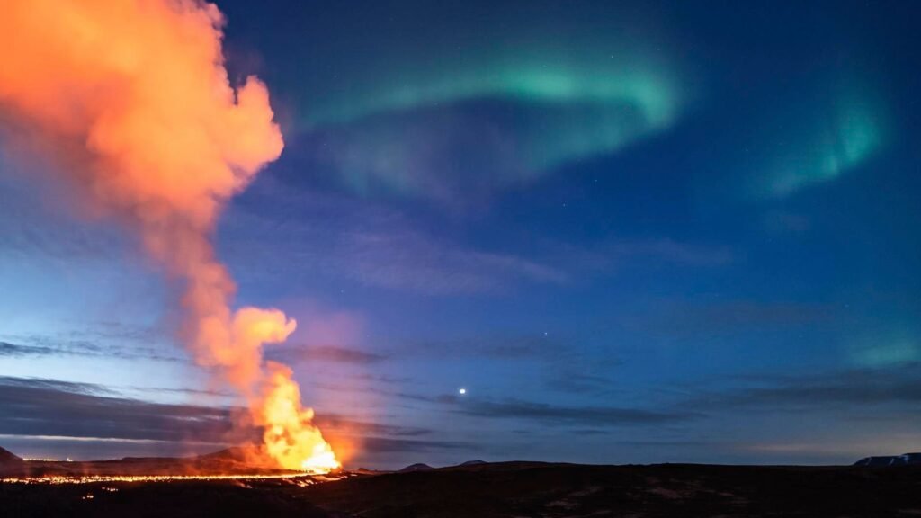 Watch Aurora And An Erupting Volcano In Stunning Video