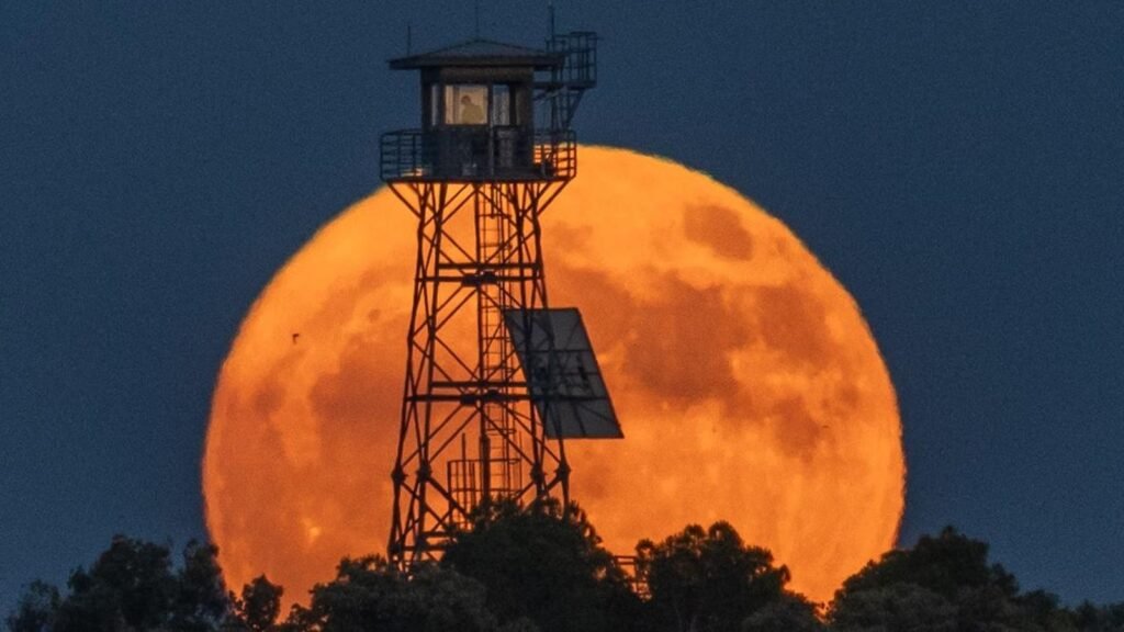 The "strawberry Moon" Full Moon Rise Marks The Once Every